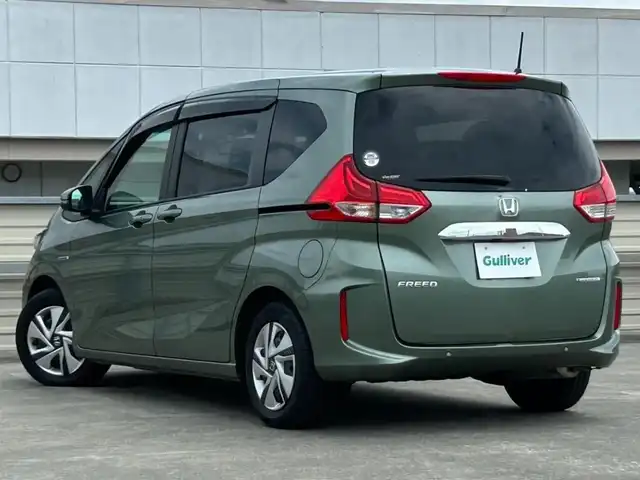 ホンダ フリード ハイブリット G ホンダセンシング 静岡県 2021(令3)年 1.4万km シルバーミストグリーンM 純正メモリナビ /フルセグTV /バックカメラ /ACC/ビルトインETC/USB充電/Bluetooth/CD/DVD再生あり /ホンダセンシング/両側電動スライドドア /シートヒーター /アイドリングストップ /スマートキー/アクティブコーナリングライト/LEDヘッドライト/Cパッケージ