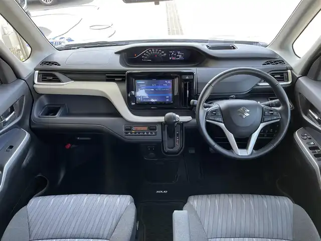 スズキ ソリオ HV MZ 東京都 2023(令5)年 4.2万km ピュアホワイトP ケンウッドナビ/バックモニター/デュアルカメラブレーキサポート/車線逸脱警報機能/パーキングソナー/シートヒーター/アダプティブクルーズ/両側電動スライドドア/横滑り防止措置/スマートキー