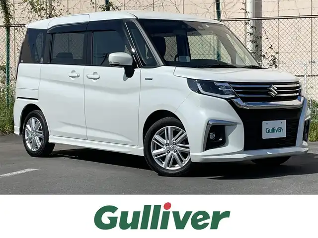 スズキ ソリオ HV MZ 東京都 2023(令5)年 4.2万km ピュアホワイトP ケンウッドナビ/バックモニター/デュアルカメラブレーキサポート/車線逸脱警報機能/パーキングソナー/シートヒーター/アダプティブクルーズ/両側電動スライドドア/横滑り防止措置/スマートキー