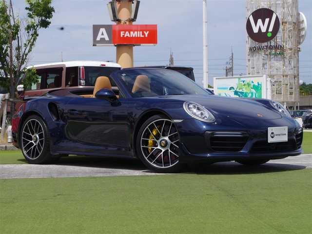 ポルシェ ９１１ ターボS カブリオレ 千葉県 2016(平28)年 1.8万km ナイトブルーメタリック ＝＝ナイトブルーメタリック＝＝/４WD・ツインターボ/スポーツクロノ/可動式前後スポイラー/PCCB/ ・ポルシェセラミックコンボジットブレーキ/BOSEサウンドシステム/アダプティブクルーズコントロール/センターロック２０inAW/ ・F:245/35 ZR20/ ・R:305/30 ZR20/ ・PILOT SPORT 4S (N0)2024年製/レザーシート/ ・前席パワーシート/ ・運転席シートメモリー/ ・前席シートヒーター機能/ ・前席ベンチレーション機能/ ステアリングヒーター/メーカーナビゲーション/ 【Bluetooth/CD/DVD/ラジオ】/バックカメラ/ビルトインETC（DSRC）/ディーラー記録簿/2016年～2021年各年数、2023年有り/新車保証書/取扱説明書/スペアキー×１