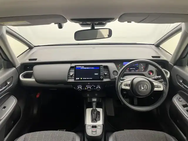 ホンダ フィット e:HEVホーム 岡山県 2020(令2)年 1.5万km プレミアムサンライトホワイトパール 純正９インチナビ/【Bluetooth/フルセグTV/USB】/純正16インチAW(オプション）/ハーフレザーシート/衝突軽減ブレーキ/追従型クルーズコントロール/ビルトインＥＴＣ/ＬＥＤヘッドライト＆LEDフォグランプ/オートハイビーム　/純正ドライブレコーダー（前後）/バックカメラ/純正フロアマット/踏み間違い防止/オートブレーキホールド/ISOFIX/ステアリングスイッチ/チルトステアリング/シートリフター/ウインカーミラー/ドアバイザー/プッシュスタート/スマートキー×2/保証書/取扱説明書/ナビ取扱説明書