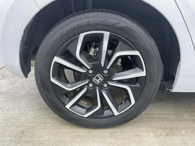 ホンダ フィット e:HEVホーム 岡山県 2020(令2)年 1.5万km プレミアムサンライトホワイトパール 純正９インチナビ/【Bluetooth/フルセグTV/USB】/純正16インチAW(オプション）/ハーフレザーシート/衝突軽減ブレーキ/追従型クルーズコントロール/ビルトインＥＴＣ/ＬＥＤヘッドライト＆LEDフォグランプ/オートハイビーム　/純正ドライブレコーダー（前後）/バックカメラ/純正フロアマット/踏み間違い防止/オートブレーキホールド/ISOFIX/ステアリングスイッチ/チルトステアリング/シートリフター/ウインカーミラー/ドアバイザー/プッシュスタート/スマートキー×2/保証書/取扱説明書/ナビ取扱説明書