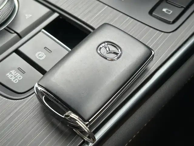 マツダ ＣＸ－６０ XD HV プレミアムスポーツ 愛媛県 2023(令5)年 3万km ソウルレッドクリスタルM 純正ナビ/AM・FM/フルセグTV/Android Auto/Apple CarPlay/4WD/パノラマサンルーフ/電動バックドア/バックカメラ/ビルトインETC/レーダークルーズコントロール/コーナーセンサー/衝突被害軽減ブレーキ/車線逸脱警報システム/ブラインドスポットモニター/レーンキーピングアシスト/交通標識認識システム/ドライバー異常時対応システム/ターボ/LEDヘッドランプ/本革巻きステアリング/ステアリングヒーター/パドルシフト/ナッパ革/スエード調コンビシート/全席シートヒーター/前席パワーシート/エアシート/純正20インチアルミホイール