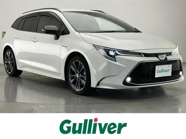 トヨタ カローラツーリング ハイブリッド ダブルバイビー 愛知県 2020(令2)年 6.5万km ホワイトパールクリスタルシャイン 純正９型ディスプレイオーディオ　バックカメラ　ＨＵＤ　ＢＳＭ　ＡＣＣ　ハーフレザーシート　ステアリングヒーター　シートヒーター　ＥＴＣ　ＬＥＤヘッドライト　フォグランプ ブレーキホールド　ルーフレール