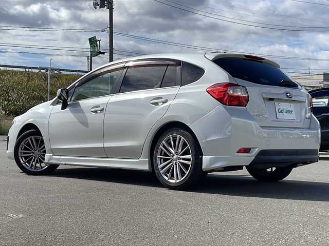 スバル インプレッサ スポーツ 2．0i－S アイサイト 青森県 2012(平24)年 7.2万km サテンホワイトパール ・4WD/・純正SDナビ/・Bluetooth/・フルセグTV/・バックカメラ/・衝突軽減ブレーキ/・レーンキープアシスト/・レーダークルーズコントロール/・パドルシフト/・純正17AW/・純正キセノンライト/・ETC/・純正フォグライト/・オートライト