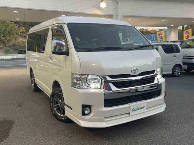 トヨタ ハイエース GL 大阪府 2021(令3)年 1.5万km ホワイトパールクリスタルシャイン /禁煙ワンオーナー//社外１０インチナビ【CN-F1X10LD】/・CD/DVD/SD/BT/フルTV//社外フリップダウンモニター【TVM-FW1300】//全周囲カメラ・バック/サイド/フロント//コーナーセンサー//デジタルインナーミラー//ETC2.0//社外16AW//レザー調シートカバー//ベットキット【FLEX】//防虫ネット【UIビークル】//片側パワースライドドア//オートハイビーム//レーンキープアシスト//ステアリングスイッチ//レザー調シートカバー//ガッツミラーレス