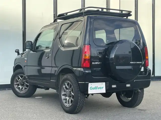 スズキ ジムニー ワイルドウィンド 大阪府 2007(平19)年 9.7万km ブルーイッシュブラックパール3 MT車　/シートヒーター　/センターでフロック　/ETC　/ドライブレコーダー　/純正フロアマット　/パワーウィンドウ　　/背面タイヤ　/ルーフレール　/スペアキー　/保証書　記録簿　/取扱説明書　