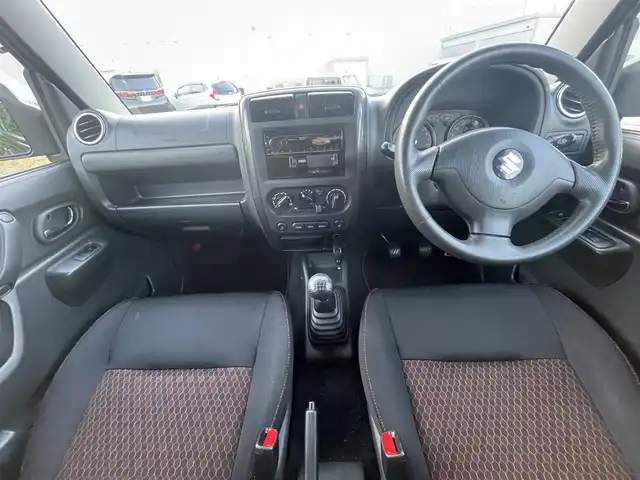 スズキ ジムニー ワイルドウィンド 大阪府 2007(平19)年 9.7万km ブルーイッシュブラックパール3 MT車　/シートヒーター　/センターでフロック　/ETC　/ドライブレコーダー　/純正フロアマット　/パワーウィンドウ　　/背面タイヤ　/ルーフレール　/スペアキー　/保証書　記録簿　/取扱説明書　