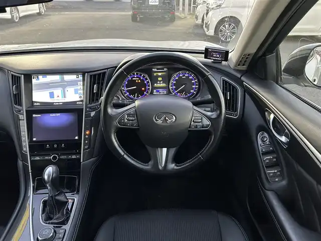 日産 スカイライン 200GT－t 群馬県 2015(平27)年 11万km クリスタルホワイトパール (株)IDOMが運営する【じしゃロン伊勢崎店】の自社ローン対象車両になります。こちらは現金ご利用時の価格です。/自社ローンご希望の方は別途その旨お申付け下さい。/メーカー純正ナビ/ＣＤ/DVD/BlueTooth/MSV/AUX/フルセグＴＶ/バックカメラ/クルーズコントロール/ＥＴＣ/前方ドライブレコーダー/ステアリングスイッチ/ハーフレザーシート/ＬＥＤヘッドライト/革巻ステアリング/純正オプション19インチアルミ/ターボ