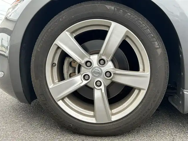 日産 フェアレディ Ｚ 広島県 2010(平22)年 5.7万km ダークメタルグレー ワンオーナー/純正ナビ/（CD/DVD/フルセグTV/Bluetooth）/バックカメラ/ETC/HIDヘッドライト/オートライト/純正18インチAW/プッシュスタート/革巻きステアリング/ステアリングスイッチ/パドルシフト/純正フロアマット/保証書/取扱説明書/スペアキー