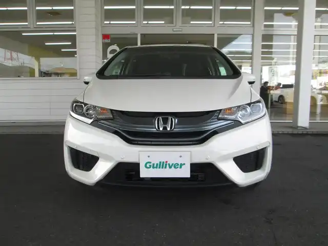 ホンダ フィット ハイブリット Lパッケージ 千葉県 2015(平27)年 0.9万km プレミアムホワイトパール 純正ナビ、ワンセグTV/バックカメラ/純正オーディオ【DVD/CD/BT/SD】/CTBA(シティブレーキアクティブシステム)/LEDヘッドライト/クルーズコントロール/革巻きステアリング/ナビ連動ステアリングスイッチ/ハーフレザーシート/前後コーナーセンサー/純正前方ドライブレコーダー/ビルトインETC/スペアキー