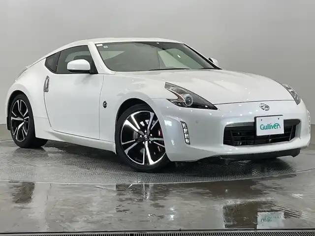 日産 フェアレディ Ｚ バージョンST 栃木県 2020(令2)年 2.5万km ブリリアントホワイトパール 純正ナビ/(フルセグTV・Bluetooth・CD・DVD・USB・HDD)/バックカメラ/前後コーナーセンサー/ハーフレザーシート/パワーシート(運転席・助手席側)/シートヒーター(運転席・助手席側)/純正リアスポイラー/純正アルミホイール/純正フロアマット/HIDヘッドライト/オートライト/スマートキー/プッシュスタート/禁煙車/保証書