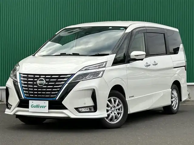日産 セレナ e－パワー ハイウェイスター V 宮城県 2020(令2)年 5.7万km ブリリアントホワイトパール セーフティパッケージB/・プロパイロット/・SRSエアバッグ（サイド/カーテン）/・インテリジェントアラウンドビューモニター/・インテリジェントパーキングアシスト/・ふらつき警報/・電動パーキングブレーキ/・オートブレーキホールド/寒冷地仕様/・前席ヒーターシート/・ステアリングヒーター  /・ヒーター付ドアミラー/・リアオートエアコン/・3列目ヒーターダクト/＝＝＝/インテリジェントエマージェンシーブレーキ/車線逸脱警報/車線逸脱防止支援システム/踏み間違い衝突防止アシスト/後側方衝突防止支援システム/後側方車両検知警報/後退時車両検知警報/標識検知機能/コーナーセンサー/純正10インチナビ/・CD/DVD/・Bluetooth/・フルセグTV/ビルトインETC/ドライブレコーダー/ハンズフリーパワースライドドア（両側）/革巻きステアリング/ステアリングスイッチ/LEDヘッドランプ/フォグランプ/オートライト/スマートキー＆プッシュスタート/15インチAW/フロアマット/ドアバイザー