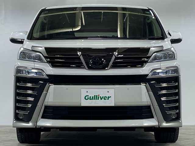 トヨタ ヴェルファイア Z Gエディション 宮城県 2019(令1)年 1.3万km ホワイトパールクリスタルシャイン ワンオーナー車/純正10インチナビ【NSZN-Z68T】/AM FM フルセグTV Bluetooth CD DVD/バックカメラ/両側パワースライドドア/セーフティセンス/レーダークルーズコントロール/前席シートヒーター＋パワーシート/運転席シートメモリー機能/ビルトインETC2.0/前側ドライブレコーダー/純正フロアマット/ステアリングヒーター/革巻きステアリング/ステアリングスイッチ/パワーバックドア/電動パーキングブレーキ/ブレーキオートホールド/プッシュスタート/スマートキー/スペアキー1本/取扱説明書/保証書/助手席・2列目オットマン/LEDヘッドライト/オートマチックハイビーム/純正18インチアルミホイール/ドアバイザー/電動格納ミラー/プリクラッシュセーフティ/レーントレーシングアシスト/ロードサインアシスト