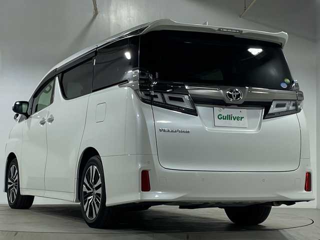 トヨタ ヴェルファイア Z Gエディション 宮城県 2019(令1)年 1.3万km ホワイトパールクリスタルシャイン ワンオーナー車/純正10インチナビ【NSZN-Z68T】/AM FM フルセグTV Bluetooth CD DVD/バックカメラ/両側パワースライドドア/セーフティセンス/レーダークルーズコントロール/前席シートヒーター＋パワーシート/運転席シートメモリー機能/ビルトインETC2.0/前側ドライブレコーダー/純正フロアマット/ステアリングヒーター/革巻きステアリング/ステアリングスイッチ/パワーバックドア/電動パーキングブレーキ/ブレーキオートホールド/プッシュスタート/スマートキー/スペアキー1本/取扱説明書/保証書/助手席・2列目オットマン/LEDヘッドライト/オートマチックハイビーム/純正18インチアルミホイール/ドアバイザー/電動格納ミラー/プリクラッシュセーフティ/レーントレーシングアシスト/ロードサインアシスト