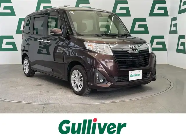 トヨタ ルーミー G S 鹿児島県 2017(平29)年 5.7万km プラムブラウンパールクリスタルシャイン 7インチ社外ナビ/・バックカメラ/Bluetooth/フルセグTV/両側パワースライド/スマートアシスト/・衝突回避支援ブレーキ/・ペダル踏み間違い時加速抑制装置/・車線逸脱警報/・先行車発信お知らせ機能/・クルーズコントロール/横滑り防止装置/コーナーセンサー/純正フロアマット/オートライト/オートエアコン/ドアバイザー/ETC/ハロゲンヘッドライト/フロントフォグランプ