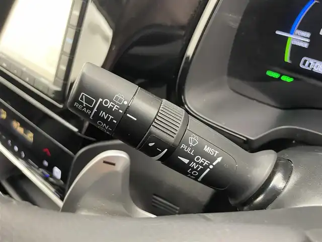ホンダ シャトル ハイブリッド X ホンダセンシング 富山県 2019(令1)年 3.1万km ミッドナイトブルービームM 純正ナビ（AM/FM/CD/BT/USB）/バックカメラ/ドライブレコーダー/ETC/ハーフレザーシート/シートヒーター/衝突被害軽減システム/レーダークルーズコントロール/レーンキープアシスト/横滑り防止装置/アイドリングストップ/オートLEDライト/フォグライト/純正アルミホイール/純正フロアマット/革巻きステアリング/ステアリングスイッチ/パドルシフト/スマートキー