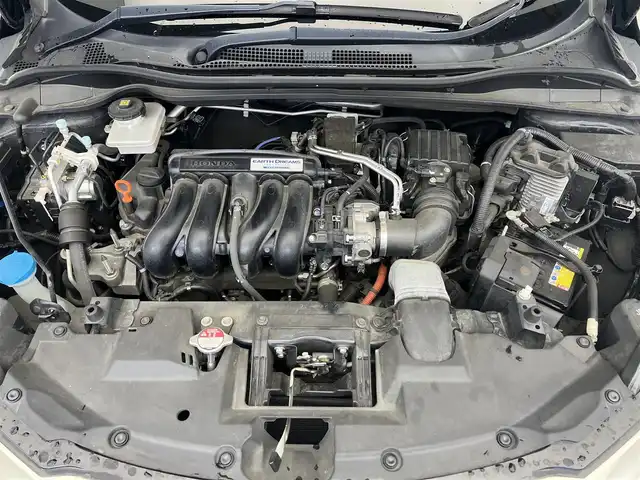 ホンダ ヴェゼル ハイブリッド Z ホンダセンシング 滋賀県 2018(平30)年 5.6万km ミッドナイトブルービームM 禁煙車/純正ナビ/(CD/DVD/フルセグ/Bluetooth)/バックカメラ/ハーフレザーシート/シートヒーター(D/N)/ドラレコ/レーダークルコン/ステアリングスイッチ/LEDヘッドライト/オートライト/レーンキープアシスト/プッシュスタート/スマートキー/スペアキー