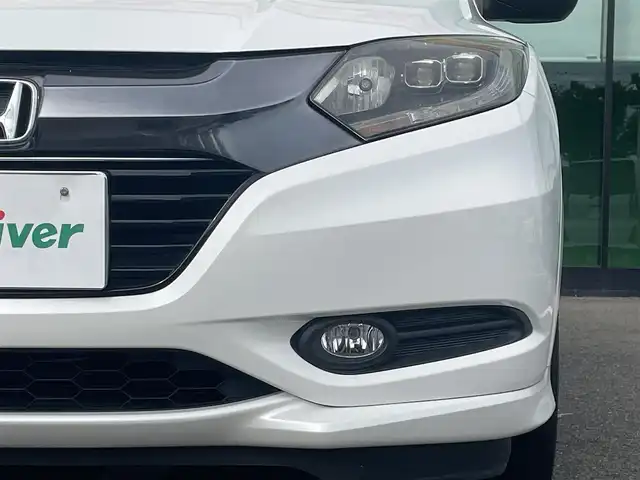 ホンダ ヴェゼル ハイブリッド Z 和歌山県 2016(平28)年 8.6万km ホワイトオーキッドパール 社外7インチナビ（MDV-Z701）/バックカメラ/フルセグTV/BT/HDMI/KENWOODツイーター/衝突軽減ブレーキ/クルーズコントロール/オートライト/横滑り防止/ドラレコ/ETC/シートヒーター/ハーフレザーシート/ルーフレール/LEDヘッドライト/フォグランプ/パドルシフト