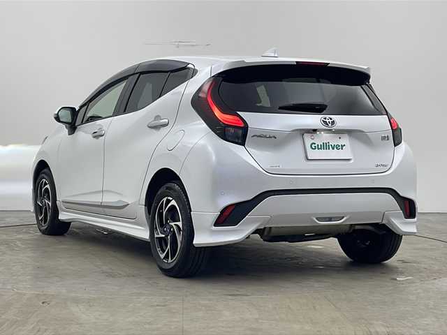 トヨタ アクア Z 秋田県 2023(令5)年 0.8万km プラチナホワイトパールマイカ 4WD/寒冷地仕様/セーフティセンス/モデリスタエアロ/純正ナビ /フルセグTV/パーキングサポートブレーキ /レーダークルーズコントロール /モデリスタAW　/全方位カメラ　/バックカメラ/運転席パワーシート /ステアリングヒーター /ライトレベライザー/フロントワイパーデアイサー/ライトレベライザー/横滑り防止装置/PCTA/AC100V/オートマチックハイビーム/オートライト/プッシュスタート/USBポート/クリアランスソナー/衝突被害軽減システム/前席シートヒーター/ハーフレザーシート/スマートキー/スペアキー有/レーンキープアシスト/ステアリングリモコン/革巻きステアリング/電格ミラー/純正フロアマット/コーナーセンサー