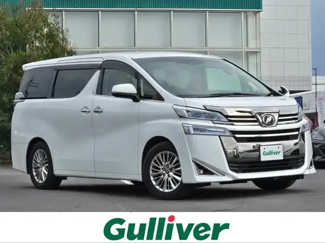 トヨタ ヴェルファイア V 鹿児島県 2018(平30)年 5.6万km ホワイトパールクリスタルシャイン 両側パワースライドドア　/純正ＳＤナビ（ＮＳＺＮ－Ｚ６８Ｔ）　/Ｂｌｕｅｔｏｏｔｈオーディオ　/ビルトインＥＴＣ　/レーダークルーズコントロール　/トヨタセーフティセンス　/Ｄ＋Ｎ席シートヒーター　/Ｄ＋Ｎ席ベンチレーション/D+N席パワーシート/レーントレーシングアシスト/リヤクロストラフィックアラート/ブラインドスポットモニター/純正アルミホイール(17インチ)/前後コーナーセンサー/LEDヘッドライト/プッシュスタート/スマートキー/エアバッグ(W+サイド)/カーテンエアバッグ