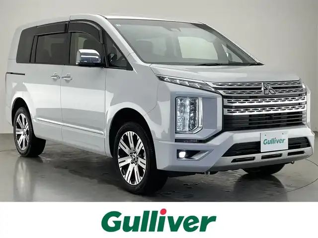 三菱 デリカＤ：５ P 愛知県 2023(令5)年 1.3万km ホワイトダイヤモンド 純正１０．１型ナビ　カープレイ　全方位カメラ　シートヒーター　電動リアゲート　両側パワースライドドア　　衝突軽減　追従クルコン　ＢＳＭ　オートステップレス　ステアリングヒーター　ＬＥＤオートライト　レザー調シートカバー　パドルシフト　フォグランプ　パワーシート　禁煙車