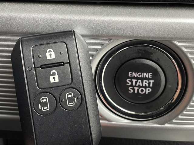スズキ スペーシア カスタム HYBRID XS ターボ 新潟県 2019(令1)年 1.8万km ピュアホワイトP デュアルセンサーブレーキサポート/社外メモリナビ/　CD/DVD/BT/フルセグ/全周囲カメラ/両側パワースライドドア/クルーズコントロール/LEDオートライト/ハーフレザーシート/純正アルミホイール/パドルシフト/フォグランプ/電格ミラー/ウィンカーミラー/スマートキー/ETC