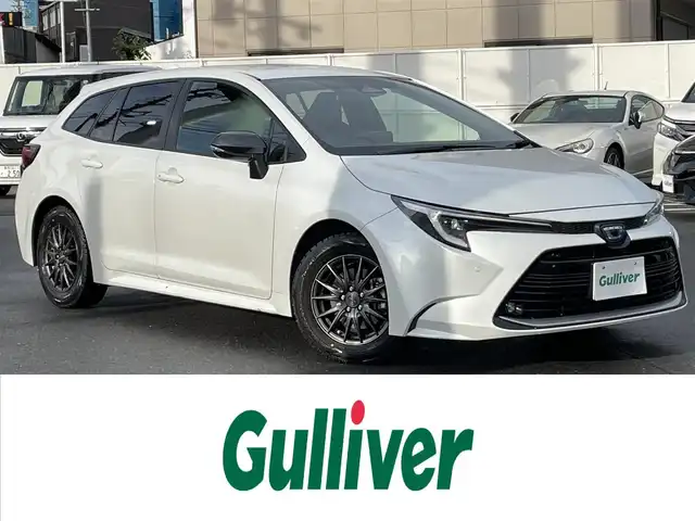トヨタ カローラツーリング ハイブリッド ダブルバイビー 長野県 2022(令4)年 3.8万km プラチナホワイトパールマイカ 純正ナビ/・Bluetooth/TV/バックカメラ/純正ETC/純正フロアマット/ハーフレザー/社外15インチAW/コーナーセンサー前後/置くだけ充電/電格ミラー/純正AWノーマルタイヤ積み込み/取り扱い説明書/保証書