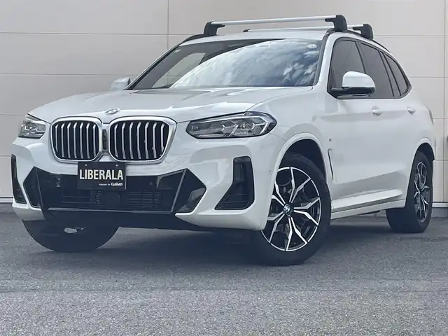 ＢＭＷ Ｘ３ xDrive20d Mスポーツ 岡山県 2022(令4)年 4.6万km アルピンホワイトⅢ HUD/純正iDrive7/アラウンドビューカメラ/モカブラウンレザーシート/シートヒーター/パワーシート/ACC/オートライト/オートハイビーム/レインセンサー/PDC/パーキングアシスト/ライトカーペット/正面衝突警告/側面衝突警告/車線逸脱警告/ステアリングサポート/車線変更警告/パドルシフト/アップルカープレイ/ミラー一体型ETC/BMW純正ルーフキャリア/ドラレコ（F/R）
