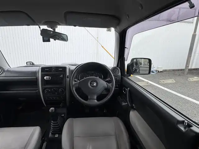 スズキ ジムニー ランドベンチャー 静岡県 2009(平21)年 10万km ブルーイッシュブラックパール3 4WD/ターボ/キーレス/社外オーディオ/革シート/D席シートヒーター/前後ドライブレコーダー/電動格納ミラー/ウィンカーミラー/社外バンパー（F・R)/取説・保証書