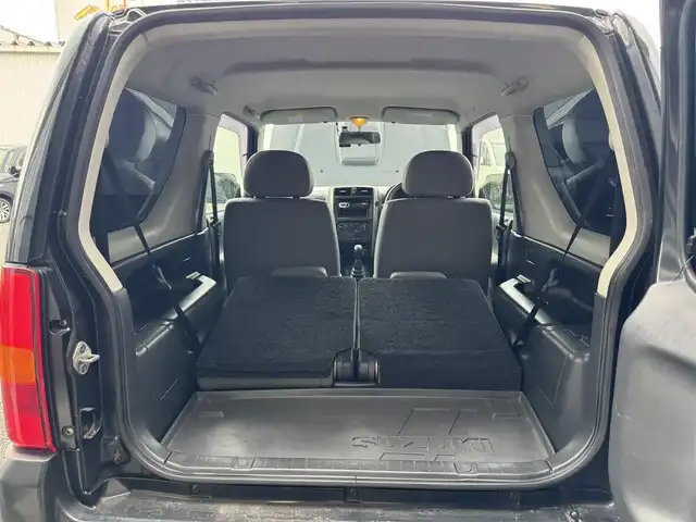 スズキ ジムニー ランドベンチャー 静岡県 2009(平21)年 10万km ブルーイッシュブラックパール3 4WD/ターボ/キーレス/社外オーディオ/革シート/D席シートヒーター/前後ドライブレコーダー/電動格納ミラー/ウィンカーミラー/社外バンパー（F・R)/取説・保証書