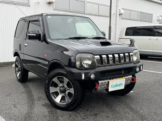 スズキ ジムニー ランドベンチャー 静岡県 2009(平21)年 10万km ブルーイッシュブラックパール3 4WD/ターボ/キーレス/社外オーディオ/革シート/D席シートヒーター/前後ドライブレコーダー/電動格納ミラー/ウィンカーミラー/社外バンパー（F・R)/取説・保証書