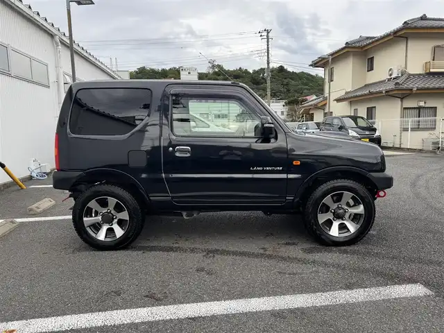 スズキ ジムニー ランドベンチャー 静岡県 2009(平21)年 10万km ブルーイッシュブラックパール3 4WD/ターボ/キーレス/社外オーディオ/革シート/D席シートヒーター/前後ドライブレコーダー/電動格納ミラー/ウィンカーミラー/社外バンパー（F・R)/取説・保証書