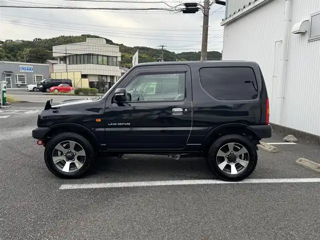 スズキ ジムニー ランドベンチャー 静岡県 2009(平21)年 10万km ブルーイッシュブラックパール3 4WD/ターボ/キーレス/社外オーディオ/革シート/D席シートヒーター/前後ドライブレコーダー/電動格納ミラー/ウィンカーミラー/社外バンパー（F・R)/取説・保証書
