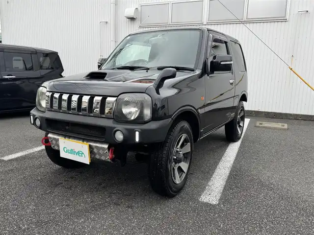スズキ ジムニー ランドベンチャー 静岡県 2009(平21)年 10万km ブルーイッシュブラックパール3 4WD/ターボ/キーレス/社外オーディオ/革シート/D席シートヒーター/前後ドライブレコーダー/電動格納ミラー/ウィンカーミラー/社外バンパー（F・R)/取説・保証書
