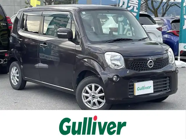 日産 モコ X FOUR 長野県 2013(平25)年 9万km アーバンブラウン 社外ナビ（FM/AM、CD、DVD、USB）/バックカメラ/ETC/チップアップシート/ハロゲンオートライト/D席パワーシート/純正フロアマット/社外１３AW/ダブルエアバック/ABS/４WD/エンジンスターター/保証書、取扱説明書/スマートキー