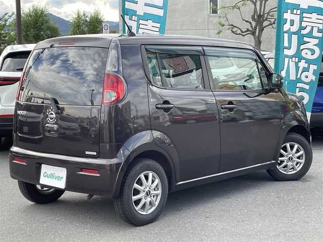 日産 モコ X FOUR 長野県 2013(平25)年 9万km アーバンブラウン 社外ナビ（FM/AM、CD、DVD、USB）/バックカメラ/ETC/チップアップシート/ハロゲンオートライト/D席パワーシート/純正フロアマット/社外１３AW/ダブルエアバック/ABS/４WD/エンジンスターター/保証書、取扱説明書/スマートキー