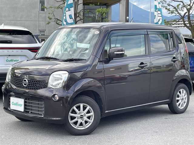 日産 モコ X FOUR 長野県 2013(平25)年 9万km アーバンブラウン 社外ナビ（FM/AM、CD、DVD、USB）/バックカメラ/ETC/チップアップシート/ハロゲンオートライト/D席パワーシート/純正フロアマット/社外１３AW/ダブルエアバック/ABS/４WD/エンジンスターター/保証書、取扱説明書/スマートキー