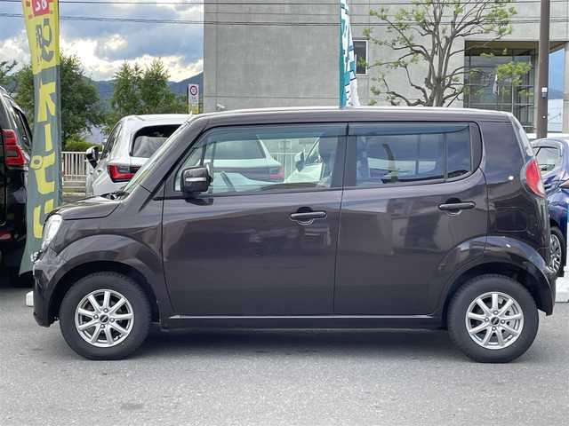 日産 モコ X FOUR 長野県 2013(平25)年 9万km アーバンブラウン 社外ナビ（FM/AM、CD、DVD、USB）/バックカメラ/ETC/チップアップシート/ハロゲンオートライト/D席パワーシート/純正フロアマット/社外１３AW/ダブルエアバック/ABS/４WD/エンジンスターター/保証書、取扱説明書/スマートキー