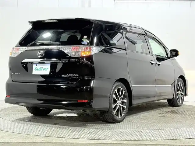 トヨタ エスティマ アエラス プレミアムエディション 大阪府 2013(平25)年 5.8万km ブラック 社外ナビ(フルセグ/DVD再生/Bluetooth) バックカメラ 後席モニター ETC 両側パワースライドドア ハーフレザー パワーシート オットマン クルコン オートライト スマートキー