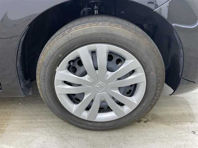 ホンダ フィット e:HEVホーム 岡山県 2021(令3)年 3.2万km クリスタルブラックパール 純正８インチSDナビ/【Bluetooth/フルセグTV/USB接続】/衝突軽減ブレーキ/追従型クルーズコントロール/ビルトインＥＴＣ/ＬＥＤヘッドライト/オートハイビーム/バックカメラ/純正ドライブレコーダー（前後）/踏み間違い防止/オートブレーキホールド/ISOFIX/ステアリングスイッチ/チルトステアリング/シートリフター/ウインカーミラー/ドアバイザー/スマートキー×2