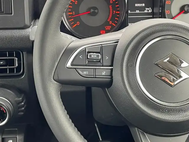 スズキ ジムニー シエラ JC 滋賀県 2023(令5)年 1.2万km ミディアムグレー ５MT/社外ルーフラック/社外ハイマウントストップランプ/社外ボンネットガード/社外リアラダー/積込夏タイヤ/６．８インチディスプレイオーディオ/（FM/AM/CD/iPod）/バックカメラ/前後ドライブレコーダー/ETC/衝突軽減ブレーキ/横滑り防止装置/レーンキープアシスト/ダウンヒルコントロール/運転席・助手席シートヒーター/運転席・助手席ドリンクホルダー/電動格納ミラー/アイドリングストップ/ステアリングスイッチ/オートライト/LEDヘッドライト/フロントフォグ/ヘッドライトウォッシャー/フルオートエアコン/ミラーヒーター/拡張シガーソケット/プッシュスタート/スマートキー/スペアキー/純正ドアバイザー