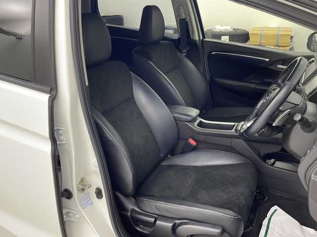 ホンダ シャトル ハイブリッド X 宮城県 2016(平28)年 7.5万km ホワイトオーキッドパール 禁煙車/あんしんパッケージ/・シティブレーキアクティブシステム/・サイドカーテンエアバッグシステム/クルーズコントロール/純正7型ナビ/・BT.CD.DVD.SD/・ワンセグTV/バックカメラ/ハーフレザシート/ビルトインETC/ドライブレコーダー（FR）/LEDヘッドライト/フォグライト/プッシュスタート/スマートキー×2/横滑り防止/パドルシフト/純正フロアマット/ドアバイザー