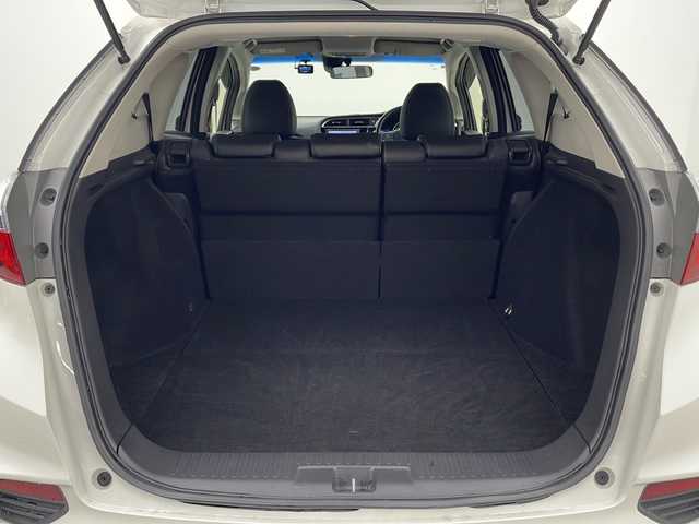 ホンダ シャトル ハイブリッド X 宮城県 2016(平28)年 7.5万km ホワイトオーキッドパール 禁煙車/あんしんパッケージ/・シティブレーキアクティブシステム/・サイドカーテンエアバッグシステム/クルーズコントロール/純正7型ナビ/・BT.CD.DVD.SD/・ワンセグTV/バックカメラ/ハーフレザシート/ビルトインETC/ドライブレコーダー（FR）/LEDヘッドライト/フォグライト/プッシュスタート/スマートキー×2/横滑り防止/パドルシフト/純正フロアマット/ドアバイザー