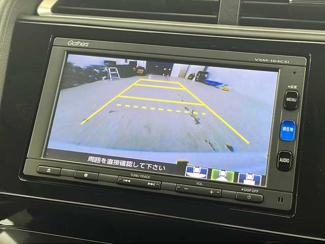 ホンダ シャトル ハイブリッド X 宮城県 2016(平28)年 7.5万km ホワイトオーキッドパール 禁煙車/あんしんパッケージ/・シティブレーキアクティブシステム/・サイドカーテンエアバッグシステム/クルーズコントロール/純正7型ナビ/・BT.CD.DVD.SD/・ワンセグTV/バックカメラ/ハーフレザシート/ビルトインETC/ドライブレコーダー（FR）/LEDヘッドライト/フォグライト/プッシュスタート/スマートキー×2/横滑り防止/パドルシフト/純正フロアマット/ドアバイザー