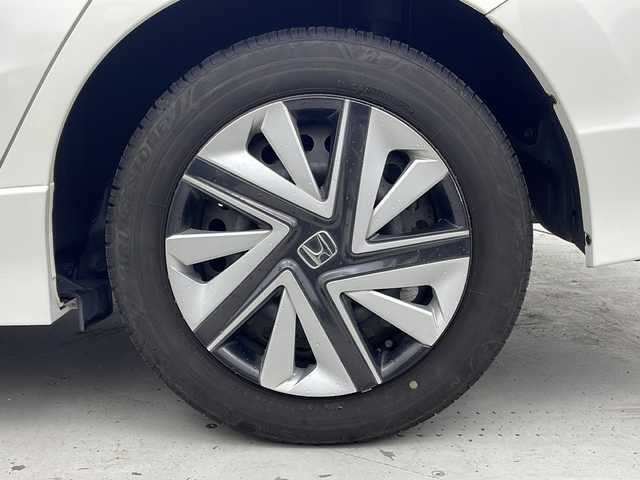 ホンダ シャトル ハイブリッド X 宮城県 2016(平28)年 7.5万km ホワイトオーキッドパール 禁煙車/あんしんパッケージ/・シティブレーキアクティブシステム/・サイドカーテンエアバッグシステム/クルーズコントロール/純正7型ナビ/・BT.CD.DVD.SD/・ワンセグTV/バックカメラ/ハーフレザシート/ビルトインETC/ドライブレコーダー（FR）/LEDヘッドライト/フォグライト/プッシュスタート/スマートキー×2/横滑り防止/パドルシフト/純正フロアマット/ドアバイザー