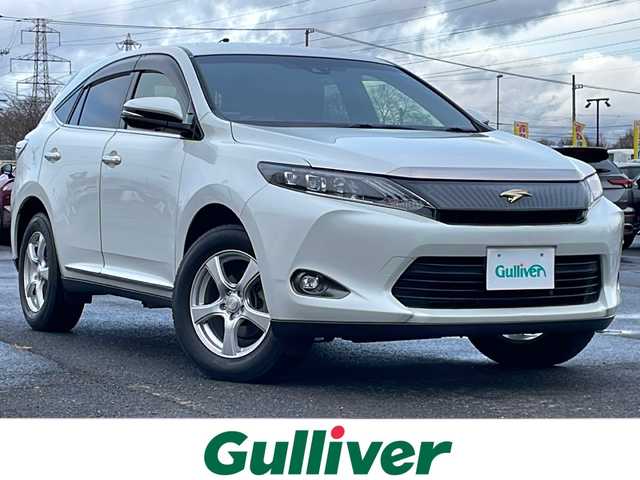 トヨタ ハリアー プレミアム 道央・札幌 2014(平26)年 5.8万km ホワイトパールクリスタルシャイン ４WD/寒冷地仕様/純正SDナビ/AM/FM/BT/SD/CD/ワンセグ/衝突被害軽減ブレーキ/横滑り防止装置/クルーズコントロール/レーンキープアシスト/バックカメラ/ビルトインETC/アイドリングストップ/ワイパーデアイサー/ECOMODE/PWRMODE/パワーバックドア/D席パワーシート/革巻きウッドコンビステアリング/自動防眩ミラー/MTモード付AT/レーダー探知機/プッシュスタート/スマートキー/LEDヘッドライト/オートライト/オートマチックハイビーム/フォグランプ/電動格納ミラー/ウィンカーミラー/純正フロアマット/ドアバイザー/スペアキー/純正エンジンスターター/純正AW付夏タイヤ積込/235/55/R18/2014年/山4mm