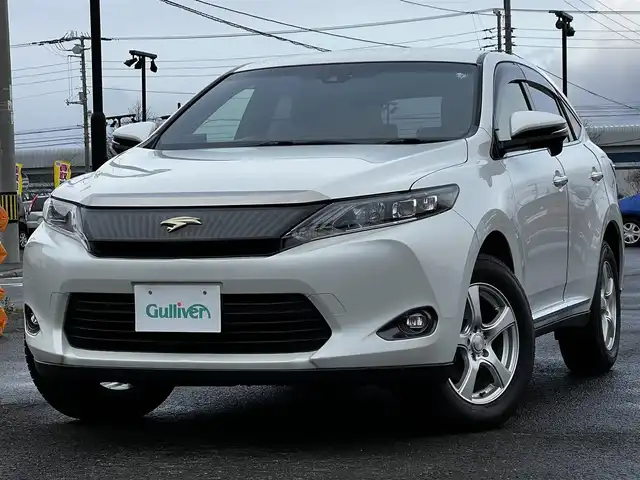 トヨタ ハリアー プレミアム 道央・札幌 2014(平26)年 5.8万km ホワイトパールクリスタルシャイン ４WD/寒冷地仕様/純正SDナビ/AM/FM/BT/SD/CD/ワンセグ/衝突被害軽減ブレーキ/横滑り防止装置/クルーズコントロール/レーンキープアシスト/バックカメラ/ビルトインETC/アイドリングストップ/ワイパーデアイサー/ECOMODE/PWRMODE/パワーバックドア/D席パワーシート/革巻きウッドコンビステアリング/自動防眩ミラー/MTモード付AT/レーダー探知機/プッシュスタート/スマートキー/LEDヘッドライト/オートライト/オートマチックハイビーム/フォグランプ/電動格納ミラー/ウィンカーミラー/純正フロアマット/ドアバイザー/スペアキー/純正エンジンスターター/純正AW付夏タイヤ積込/235/55/R18/2014年/山4mm