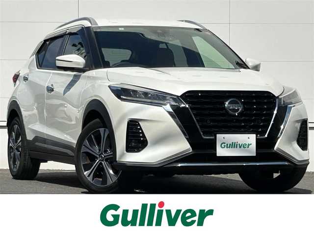 日産 キックス X ツートーンインテリアED 佐賀県 2021(令3)年 2万km ブリリアントホワイトパール プロパイロット　/インテリジェントルームミラー　/エマージェンシーブレーキ　/ソナー　/車線逸脱警報(LDW)/車線逸脱防止支援(LDP)　/純正９インチナビ/・アラウンドビューモニター/・フルセグTV/BT/CD/DVD/純正ドラレコ(DH5-D)/ルーフレール/純正17インチAW　/合皮シート/シートヒーター/LEDヘッドライト/フォグランプ/オートマチックハイビーム/電動パーキングスイッチ/・オートホールド機能/ETC2.0/プッシュスタート/ステアリングヒーター/ドアバイザー/エアバックW/サイド/カーテン/スペアキー×１/取扱説明書/保証書