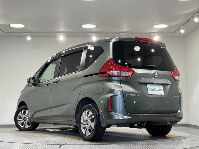 ホンダ フリード＋ ハイブリット G 愛知県 2023(令5)年 2.2万km シルバーミストグリーンM 純正ナビ　/（CD・DVD再生/FM/AM/フルセグTV/iPod/SD)/ホンダセンシング　/　　-衝突軽減ブレーキ　/　　-誤発進抑制機能/　　-アダプティブクルーズコントロール　/　　-路外逸脱抑制機能　/　　-車線維持支援システム/　　-先行車発進お知らせ/　　-標識認識機能/両側パワースライドドア　/シートヒーター　/ビルトインＥＴＣ　/バックカメラ　/前後ドライブレコーダー　/パーキングセンサー　/ＬＥＤヘッドライト/ウインドシールドデアイサー/純正フロアマット/後席サンバイザー/プッシュスタート/　　-スマートキー